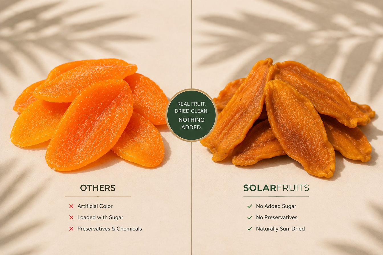 Side by side: bright orange shop-bought dried fruit next to our darker, naturally sun-dried fruit